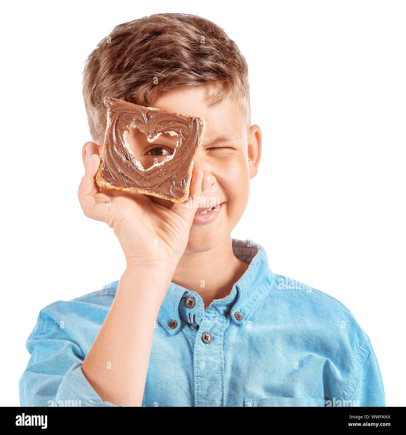 Funny little boy with tasty toast on white background Stock Photo - Alamy