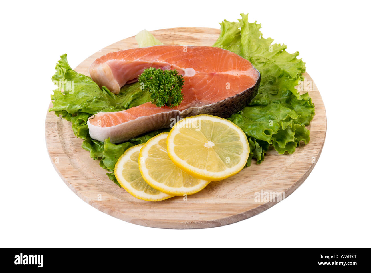 https://c8.alamy.com/comp/WWFF6T/raw-salmon-steak-on-the-wooden-board-isolated-on-white-with-clipping-path-WWFF6T.jpg