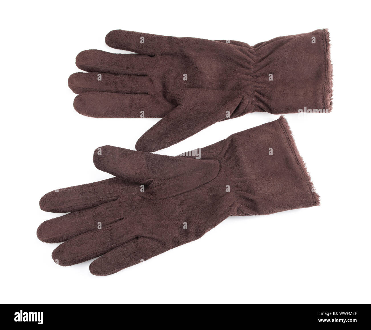 Knitted woolen brown gloves on a white background Stock Photo
