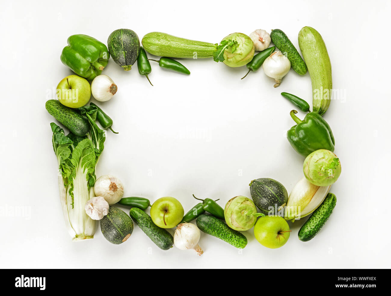 Frame made of fresh vegetables on white background Stock Photo - Alamy