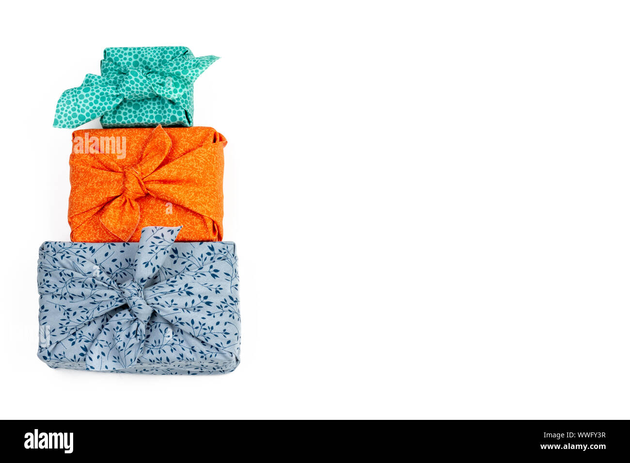 Fabric wrapped gifts, reusable sustainable gift wrapping alternative