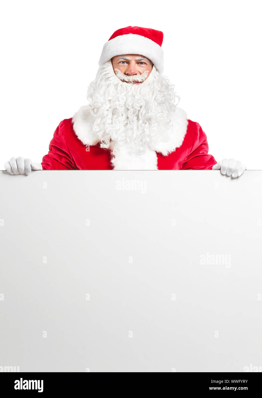 Portrait of Santa Claus with blank poster on white background Stock ...