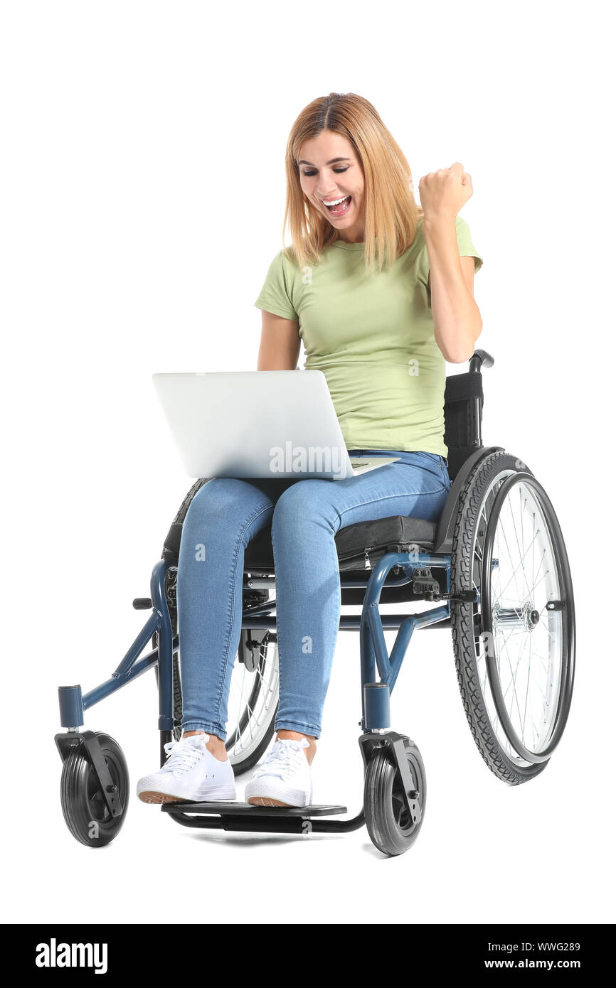 Happy woman with laptop in wheelchair on white background Stock Photo ...