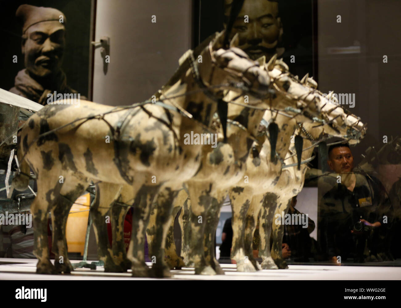 Bangkok, Thailand. 15th Sep, 2019. Visitors seen during the exhibition of Qin Shi Huang, the First Emperor of China and Terracotta Warriors at the National Museum of Thailand in Bangkok.The presentation of the world-class exhibition entitled ' Qin Shi Huang: The First Emperor of China and Terracotta Warriors' marks an unprecedented phenomenon at the Thai museum arena. They team up gather 86 items of important artefacts (133 pieces) aged over 2,200 years from 14 leading museums in China, and all antiquated objects are on display at the National Museum of Thailand. Credit: SOPA Images Limited/Al Stock Photo