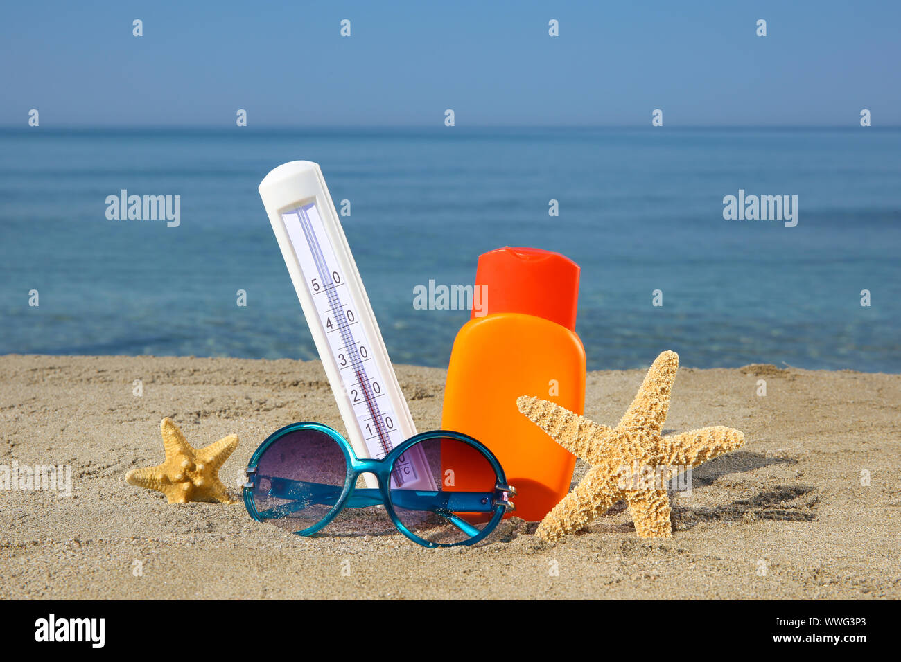 Summer women's accessories on the beach Stock Photo - Alamy
