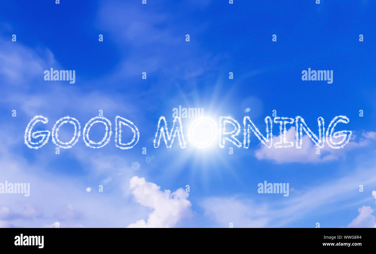 Good morning and wake up concept, cloud text on blue sky Stock Photo