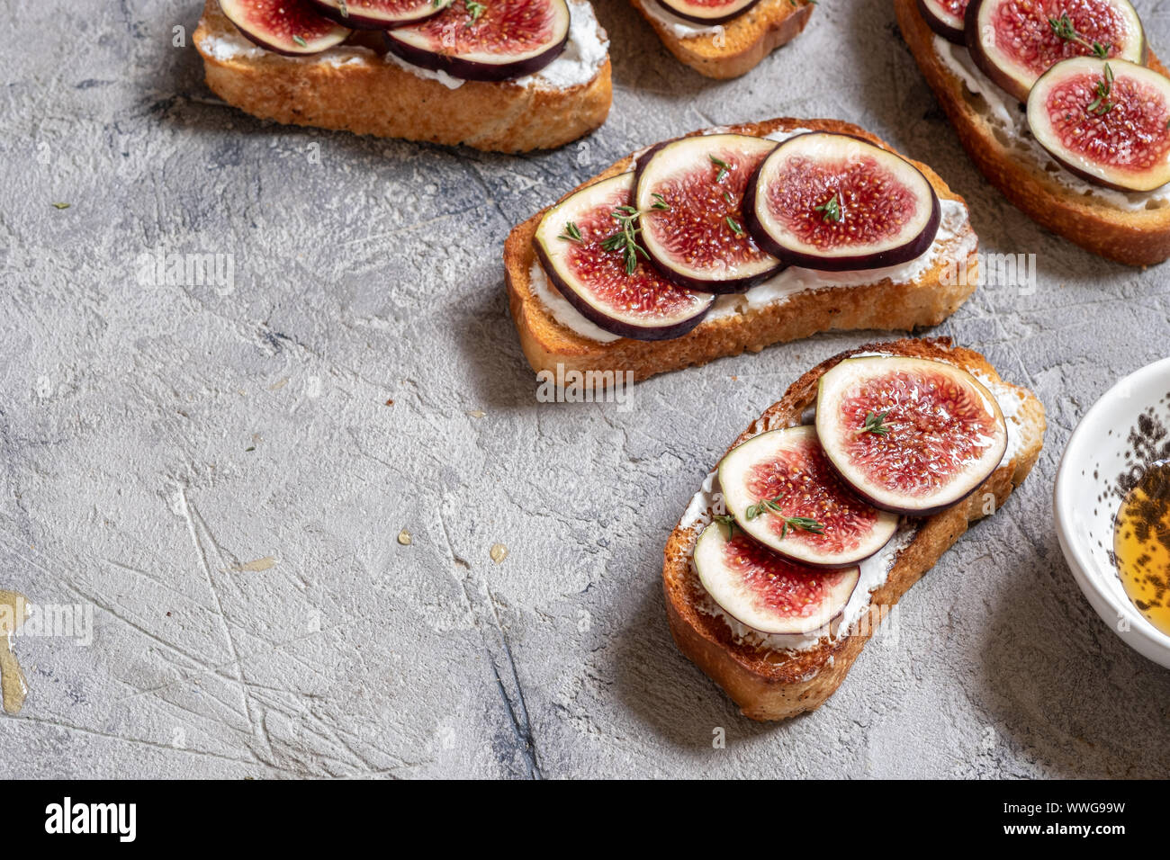 Bruschetta with figs, goat cheese and honey Stock Photo Alamy