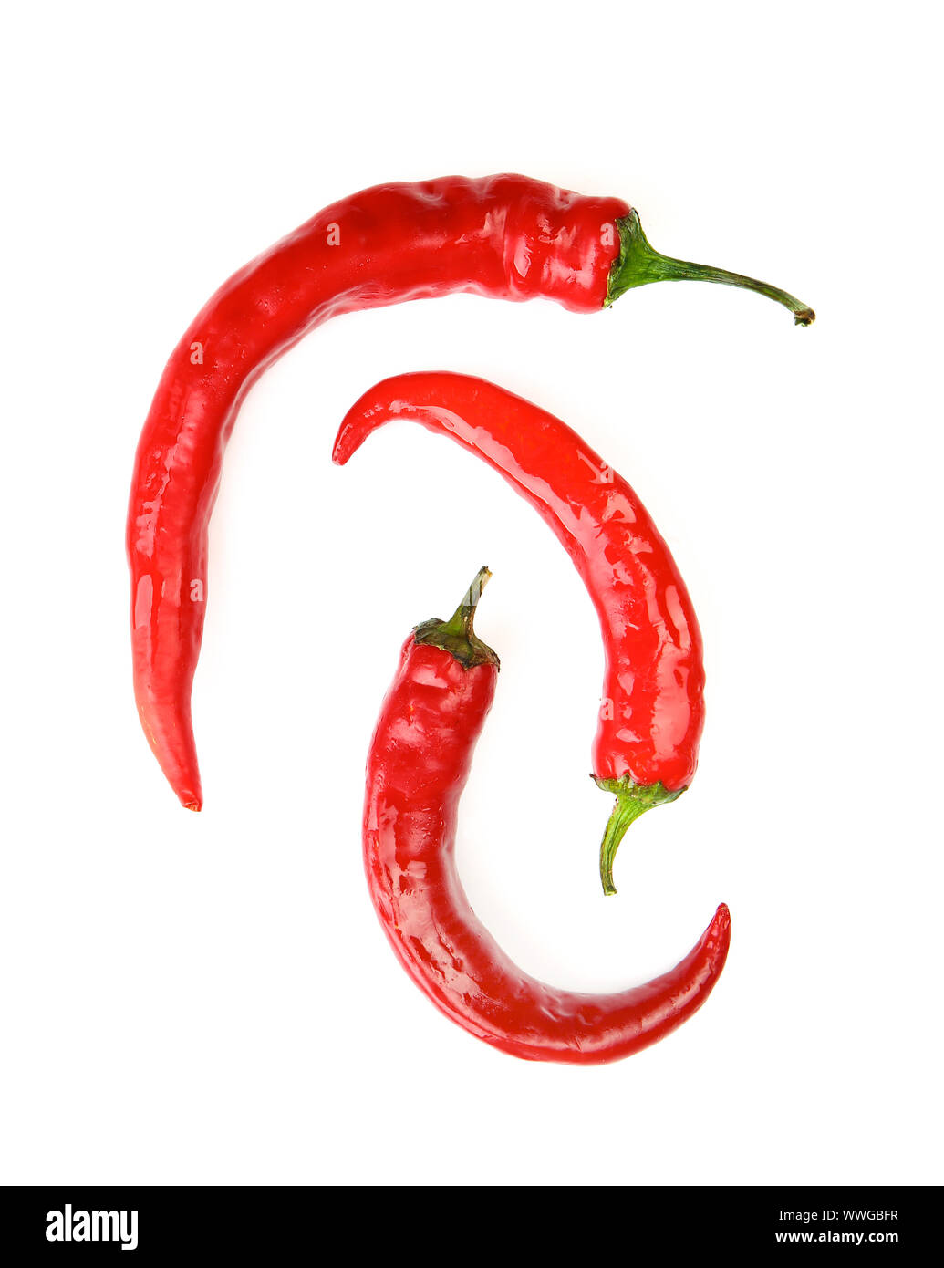 Red chili peppers on white background Stock Photo - Alamy