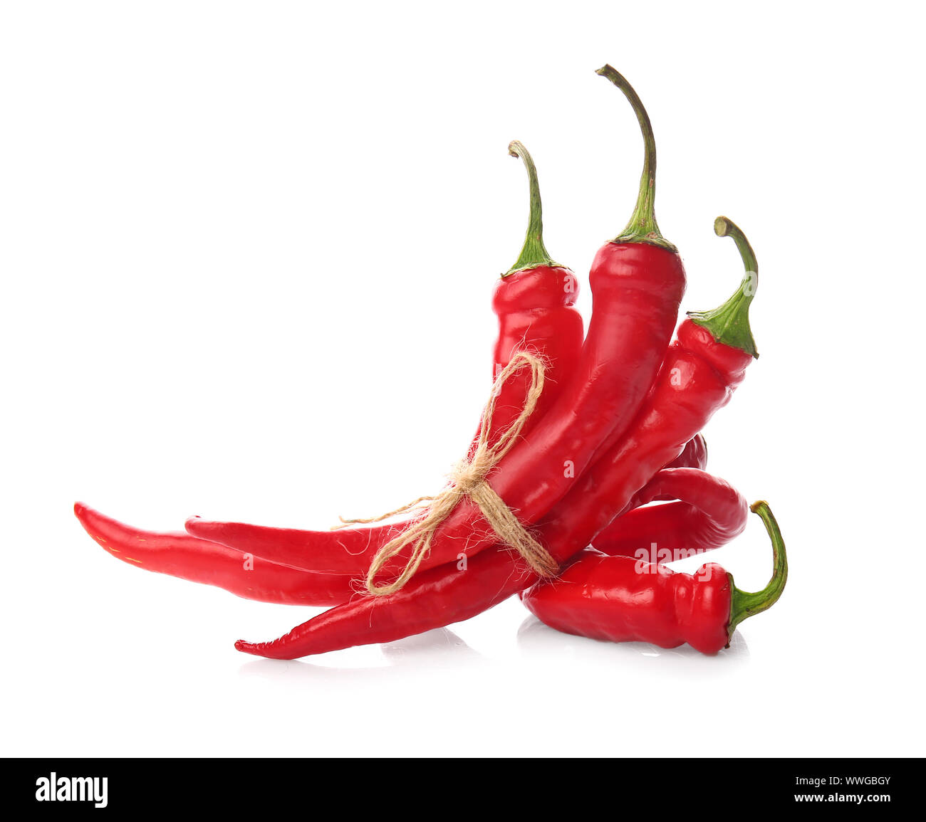 Red chili peppers on white background Stock Photo - Alamy