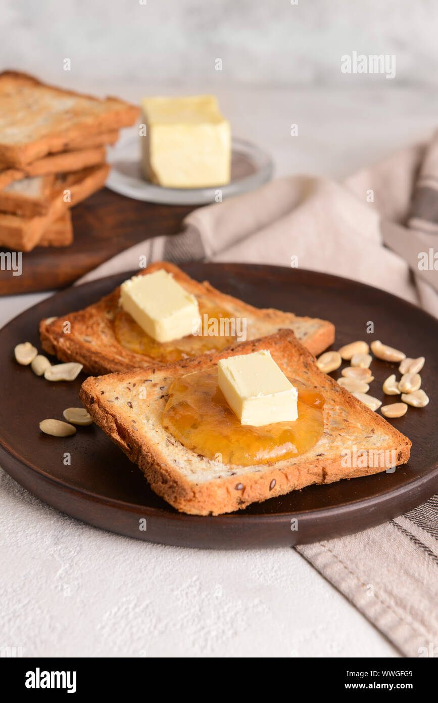 Plate With Tasty Toasted Bread Butter And Jam On Table Stock Photo Alamy Plate With Tasty Toasted Bread Butter And Jam On Table Stock Photo Alamy