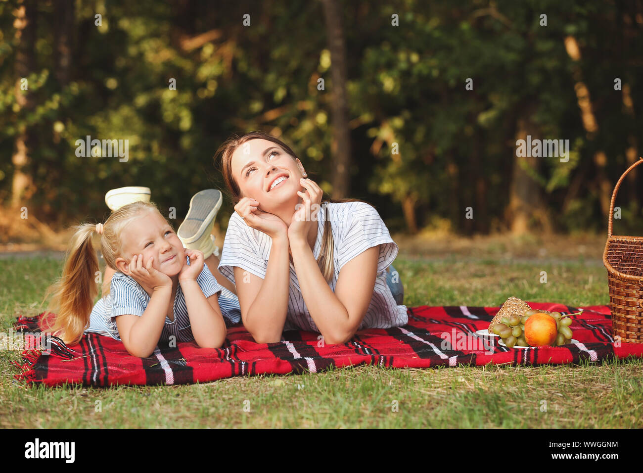 Happy mother and daughter at picnic outdoors Stock Photo - Alamy