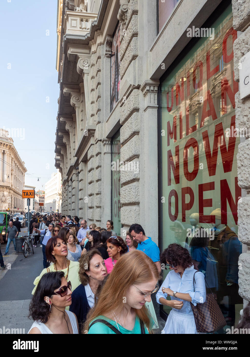 Piazza Cordusio, Milan, Italy - September 13, 2019 Crowds wait in line for  visiting the new Uniqlo store in Milan on inaguration day Stock Photo -  Alamy