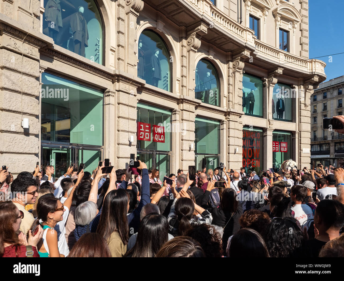 Piazza Cordusio, Milan, Italy - September 13, 2019 Crowds gathers in front  of the new Uniqlo Store waiting the doors to be opened Stock Photo - Alamy