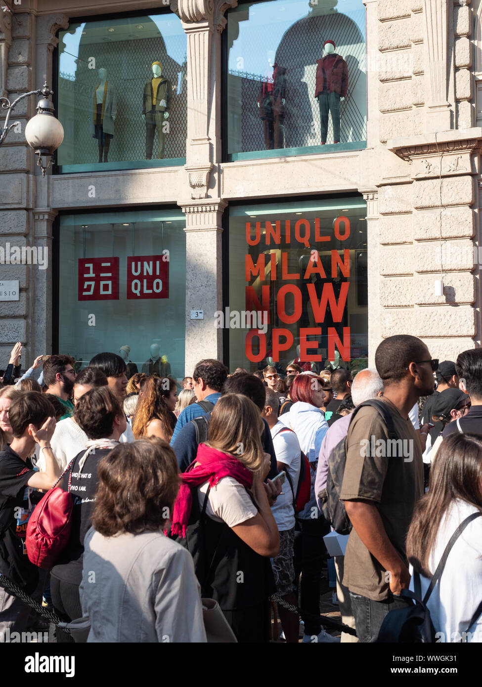 Piazza Cordusio, Milan, Italy - September 13, 2019 Crowds gathers in front  of the new Uniqlo Store waiting the doors to be opened Stock Photo - Alamy