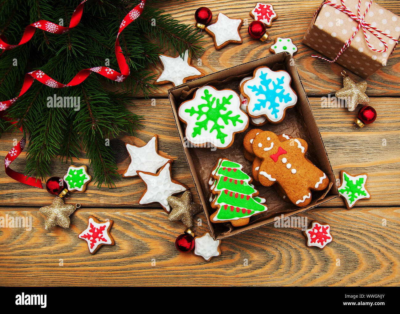 Box with Christmas cookies on a old wooden table Stock Photo - Alamy