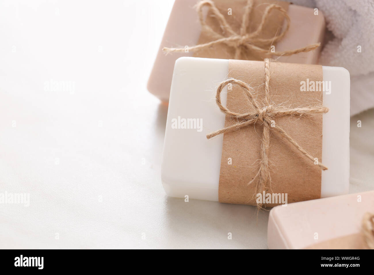 Soap bars on light background, closeup Stock Photo - Alamy