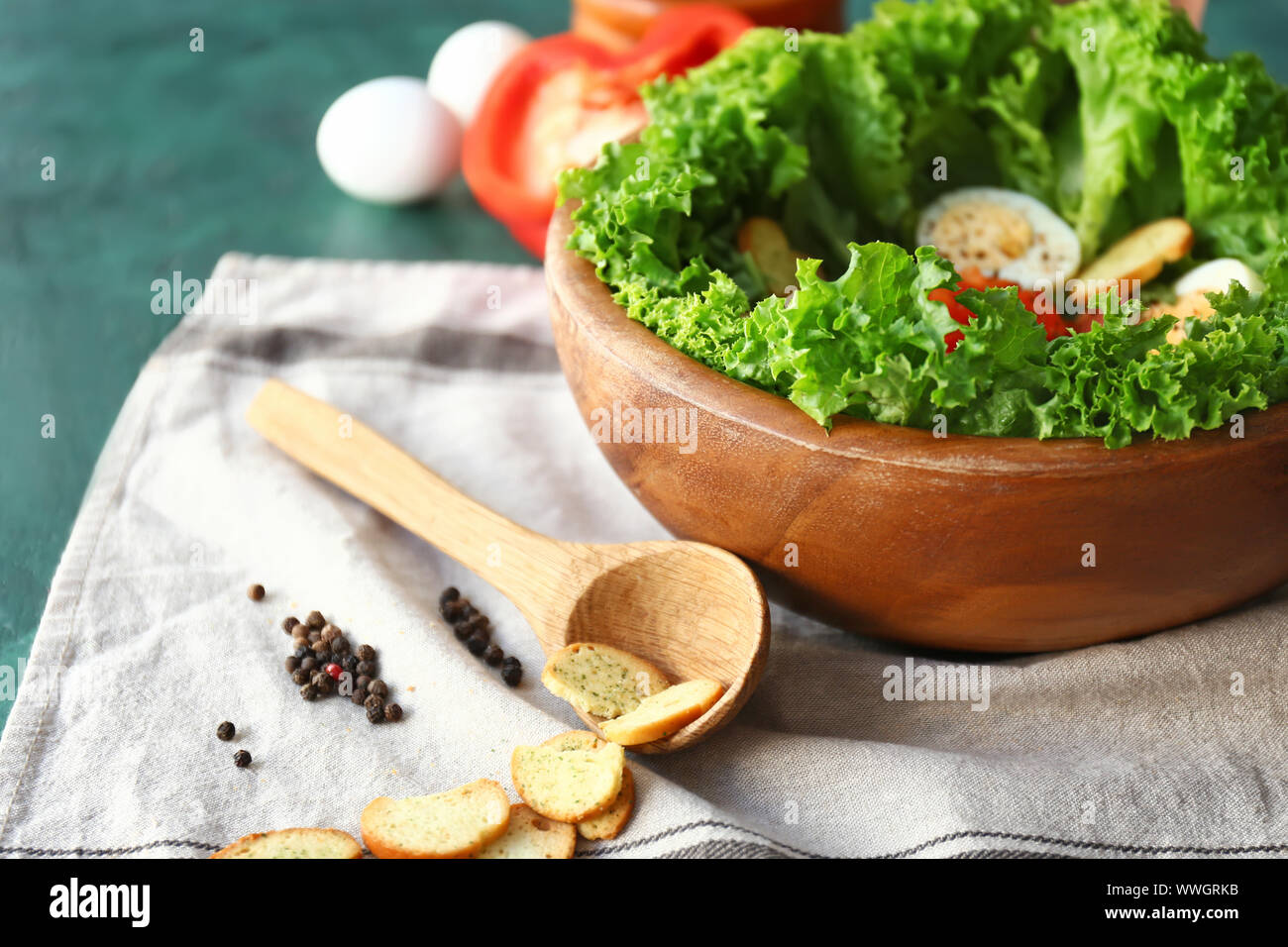 Bowl with tasty salad on table Stock Photo - Alamy