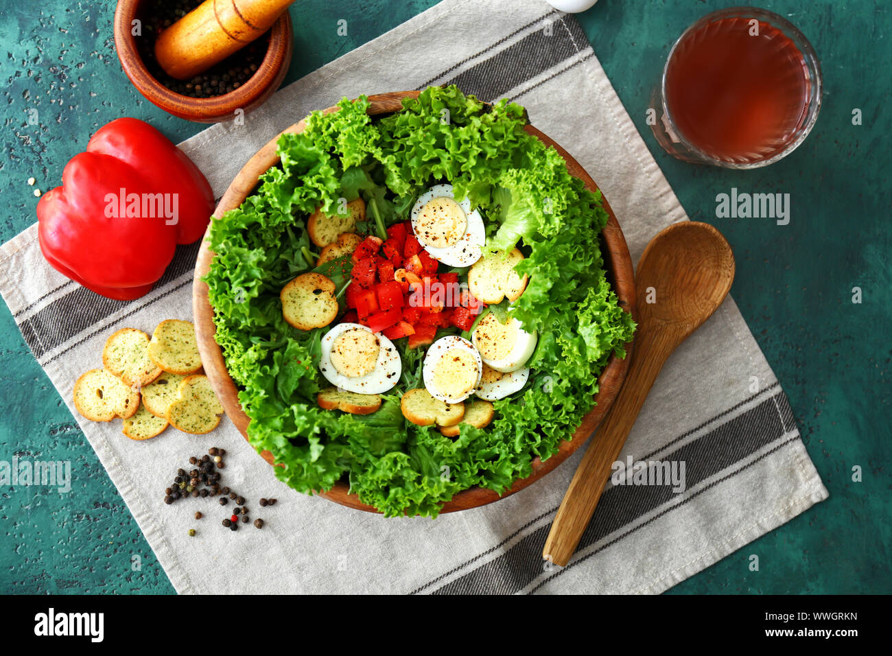 Bowl with tasty salad on table Stock Photo - Alamy