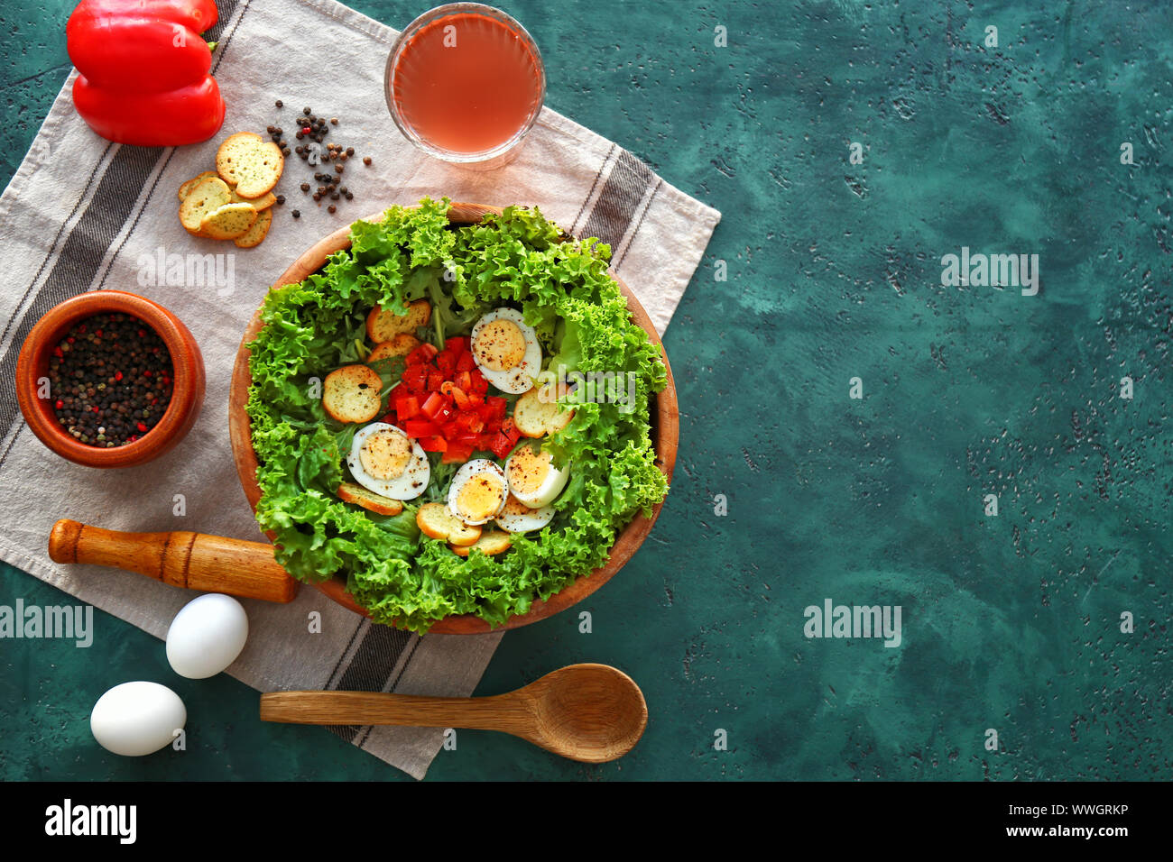Bowl with tasty salad on table Stock Photo - Alamy