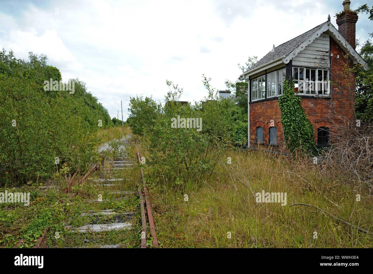 a-derelict-and-overgrown-signal-box-at-foynes-station-on-the-disused