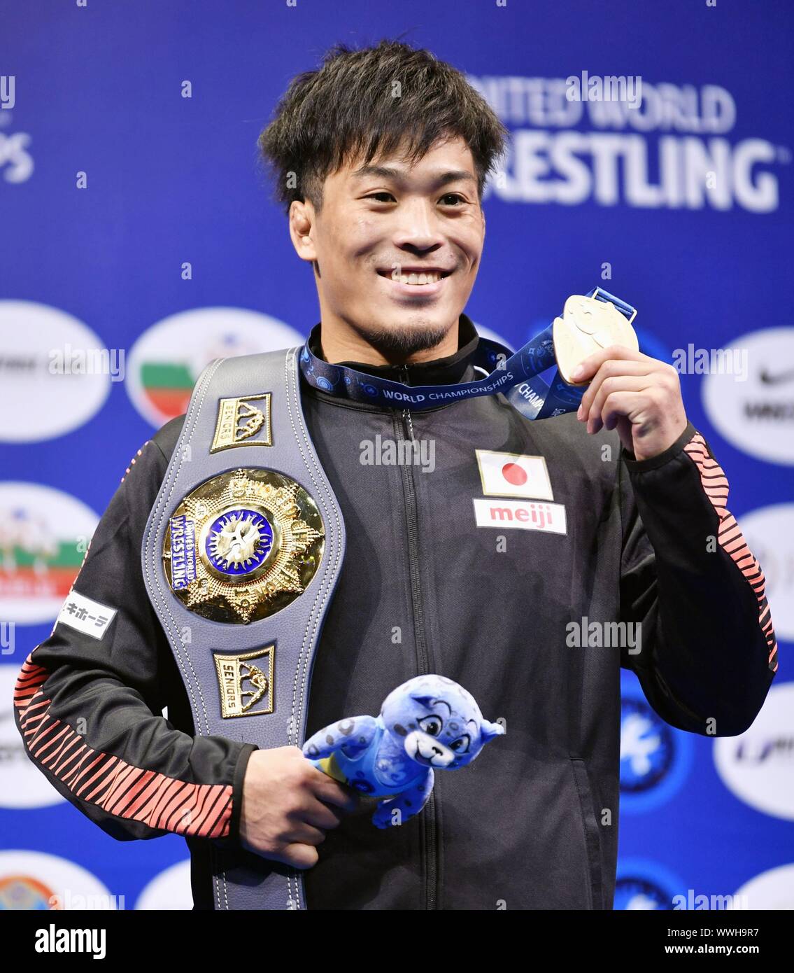 Shinobu Ota of Japan is pictured during a medal ceremony after winning