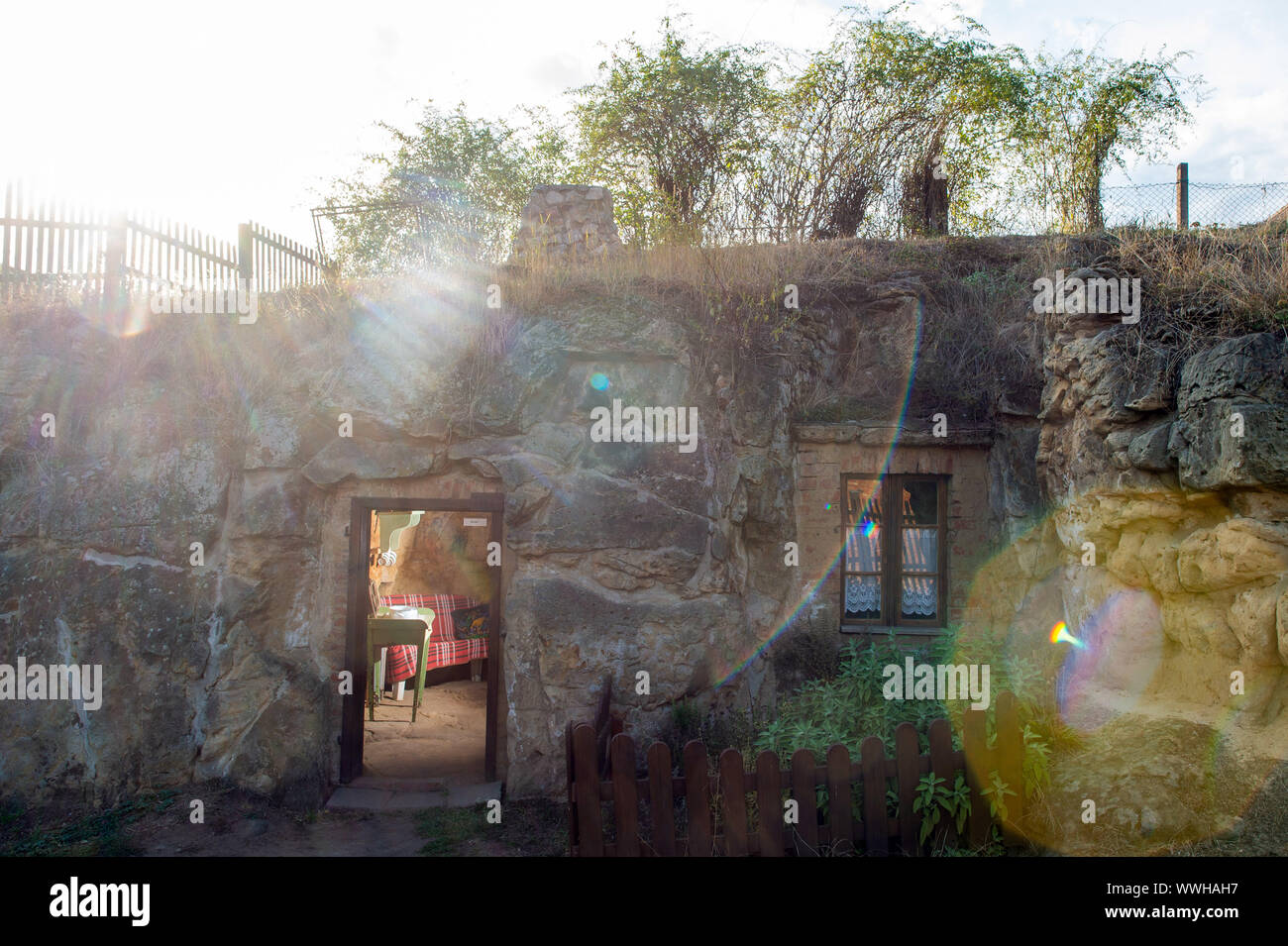 Langenstein, Germany. 11th Sep, 2019. The sun sets behind a cave