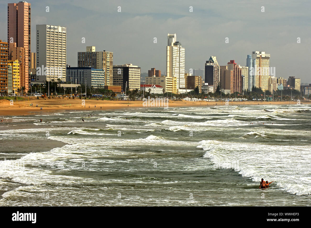Golden Mile sandy beach at the Indian Ocean and city silhouette of Durban Stock Photo