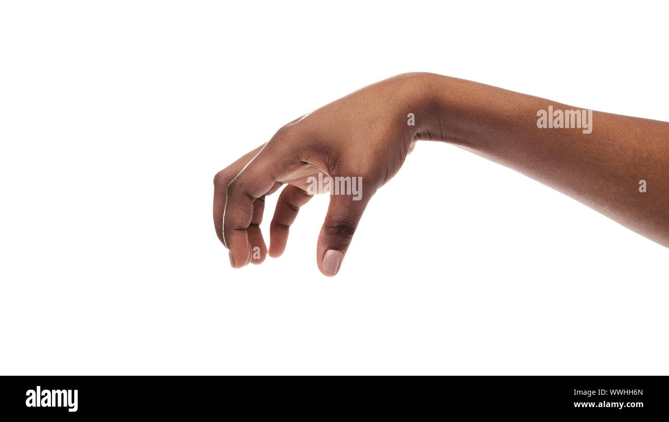 Black woman's hand making grab gesture, isolated on white background. Stock Photo