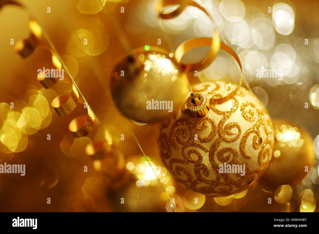 golden christmas balls on bokeh background Stock Photo - Alamy
