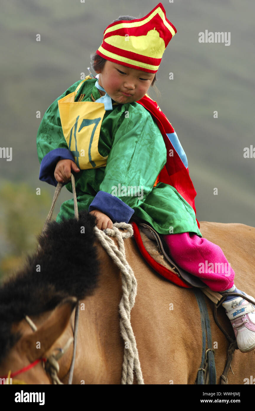 4-year-old girl on a horse Stock Photo