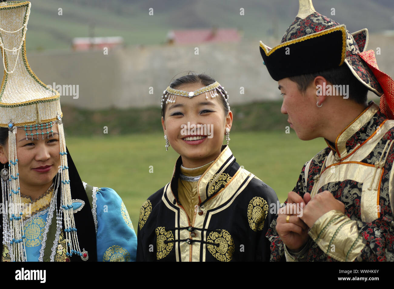 Women and a man in Mongolian costume Stock Photo
