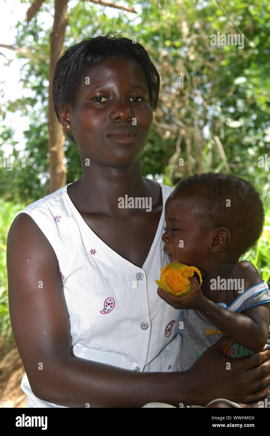 African mother with toddler, Ghana Stock Photo