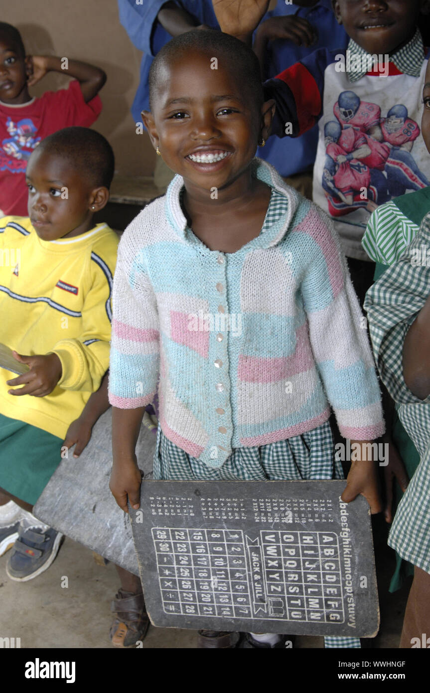 Girl with alphabet board, Ghana Stock Photo