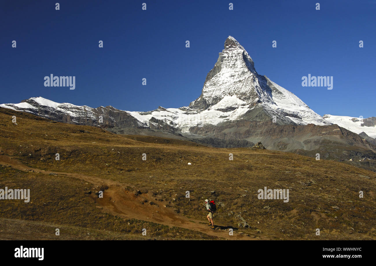 Hiking at the foot of the Matterhorn, Zermatt, Switzerland Stock Photo