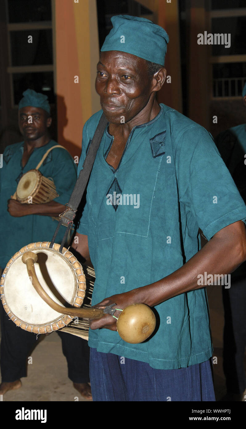 Musician with speaking drum, Burkina Faso Stock Photo
