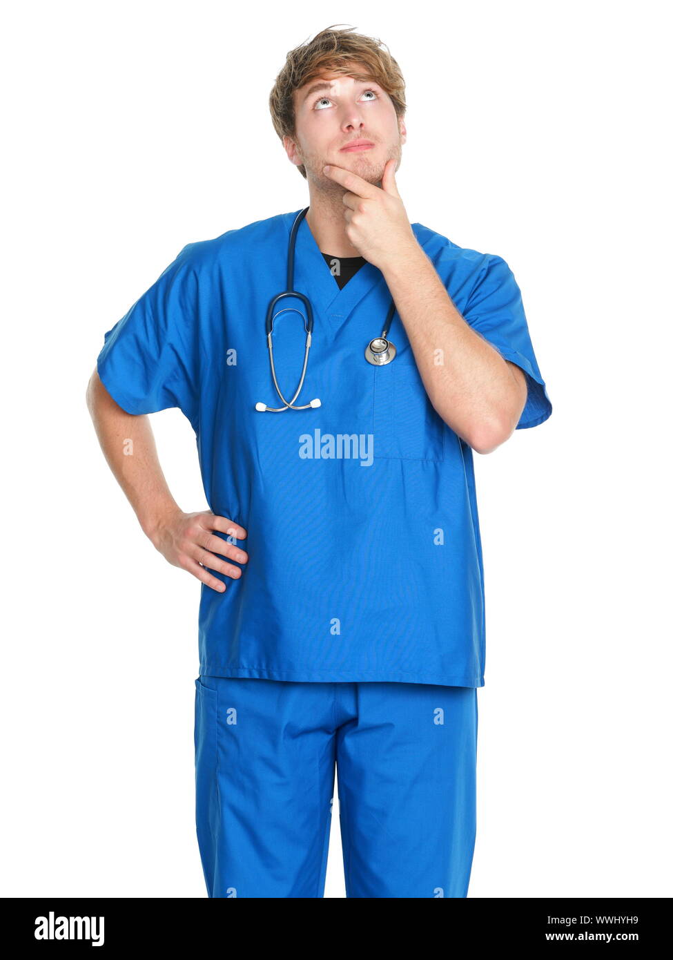 Male nurse thinking man nurse or young doctor in blue scrubs looking