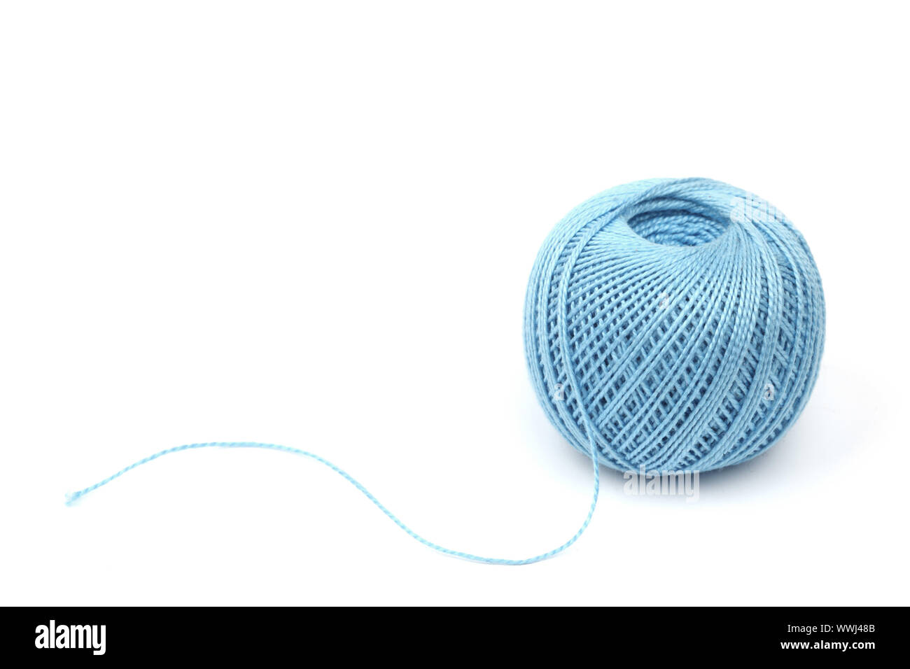 blue thread isolated on white background Stock Photo - Alamy