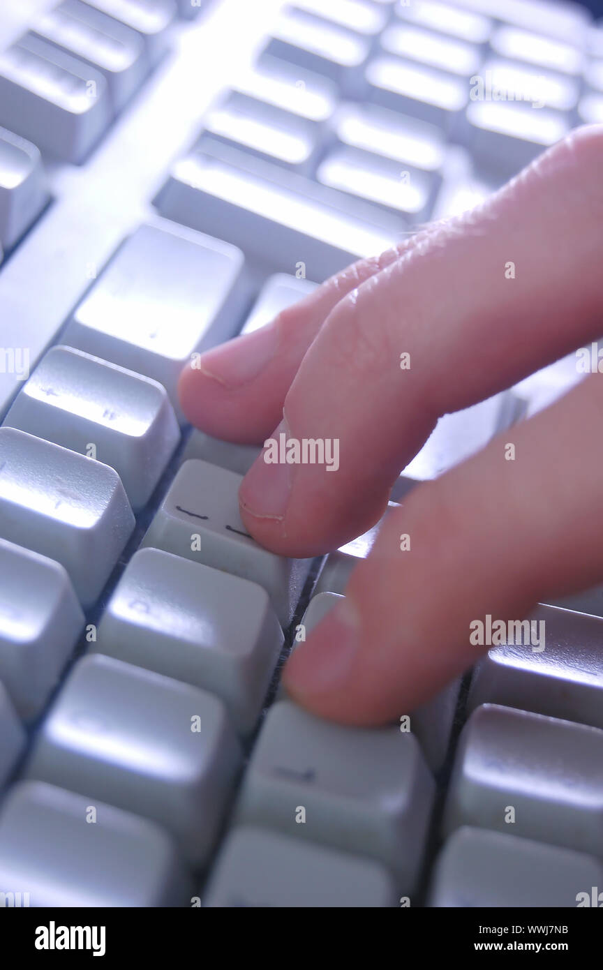 Typing on keyboard close up Stock Photo - Alamy