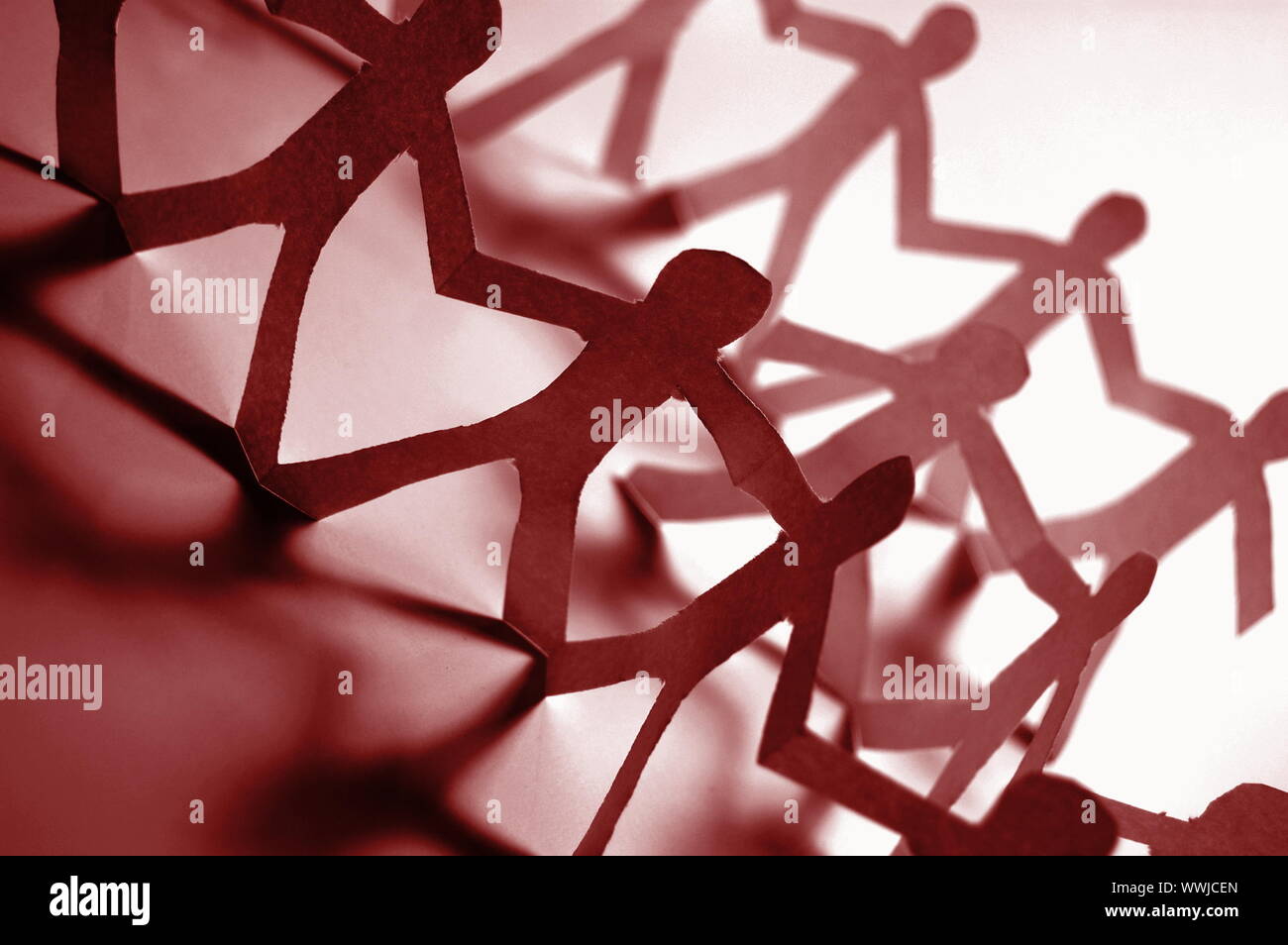 team of paper people having a party Stock Photo Alamy