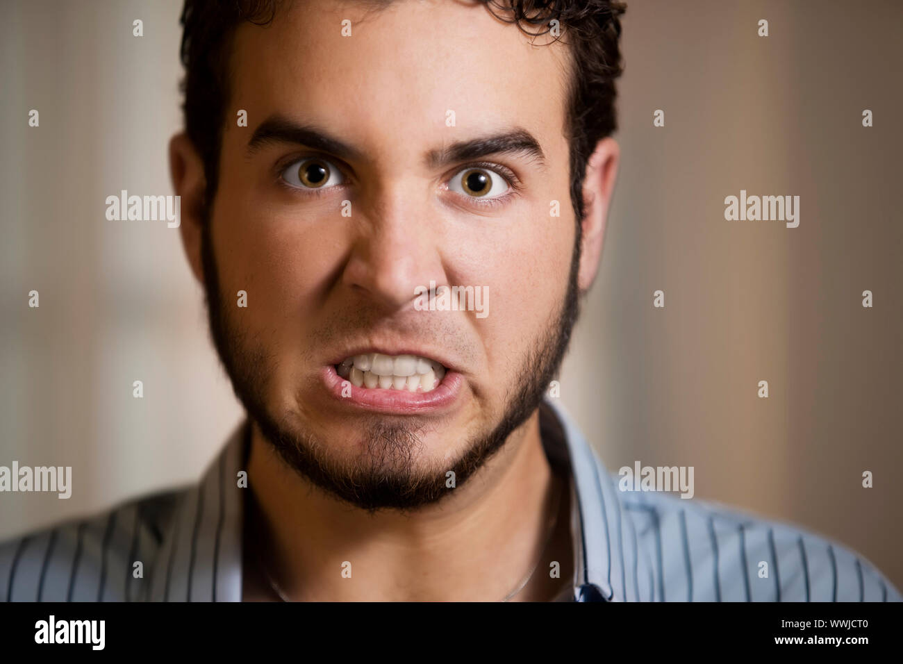 Close Up of Angry Young Man with Clenched Teeth Stock Photo Alamy