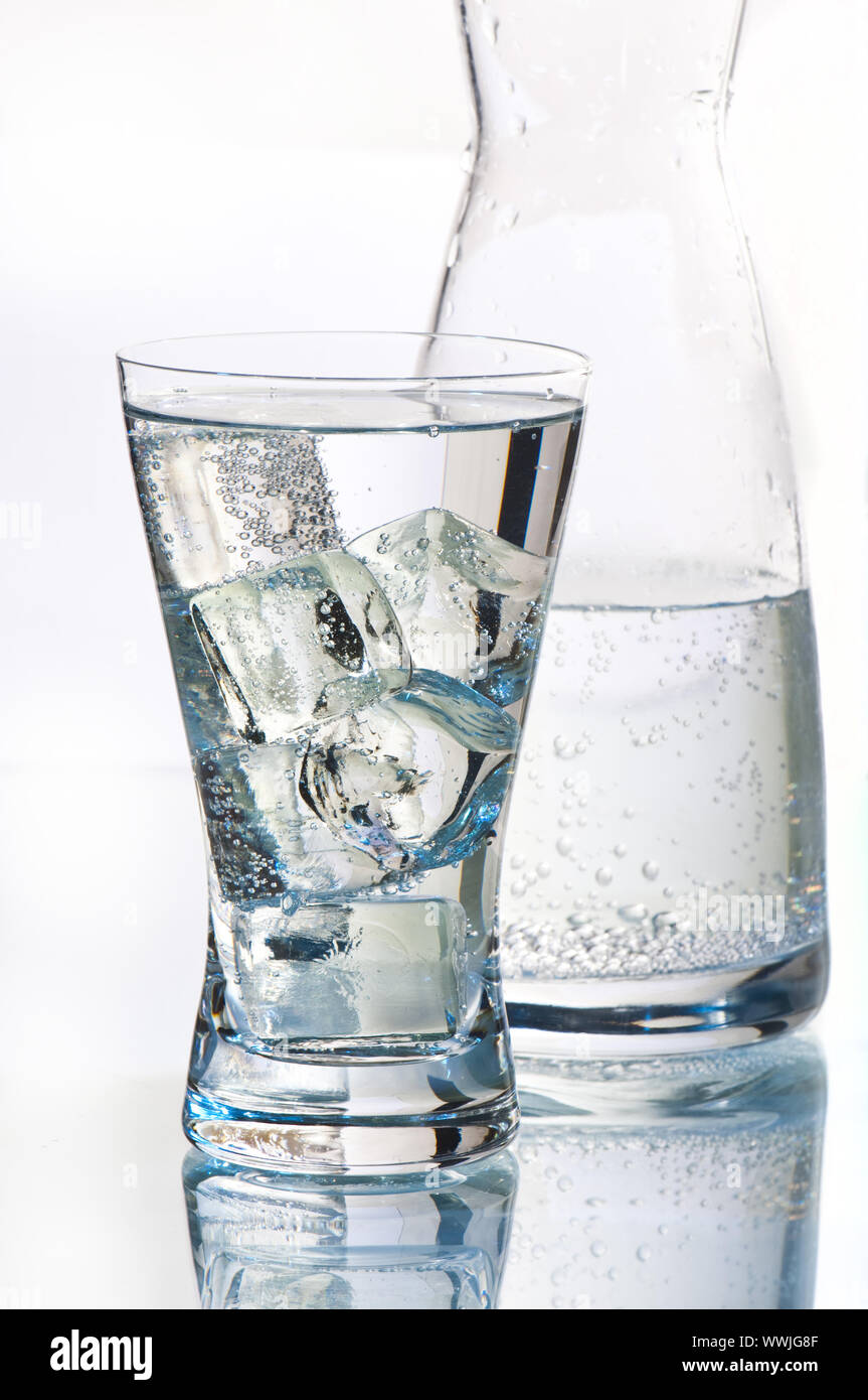 Water glass on a white background with ice cubes Stock Photo - Alamy