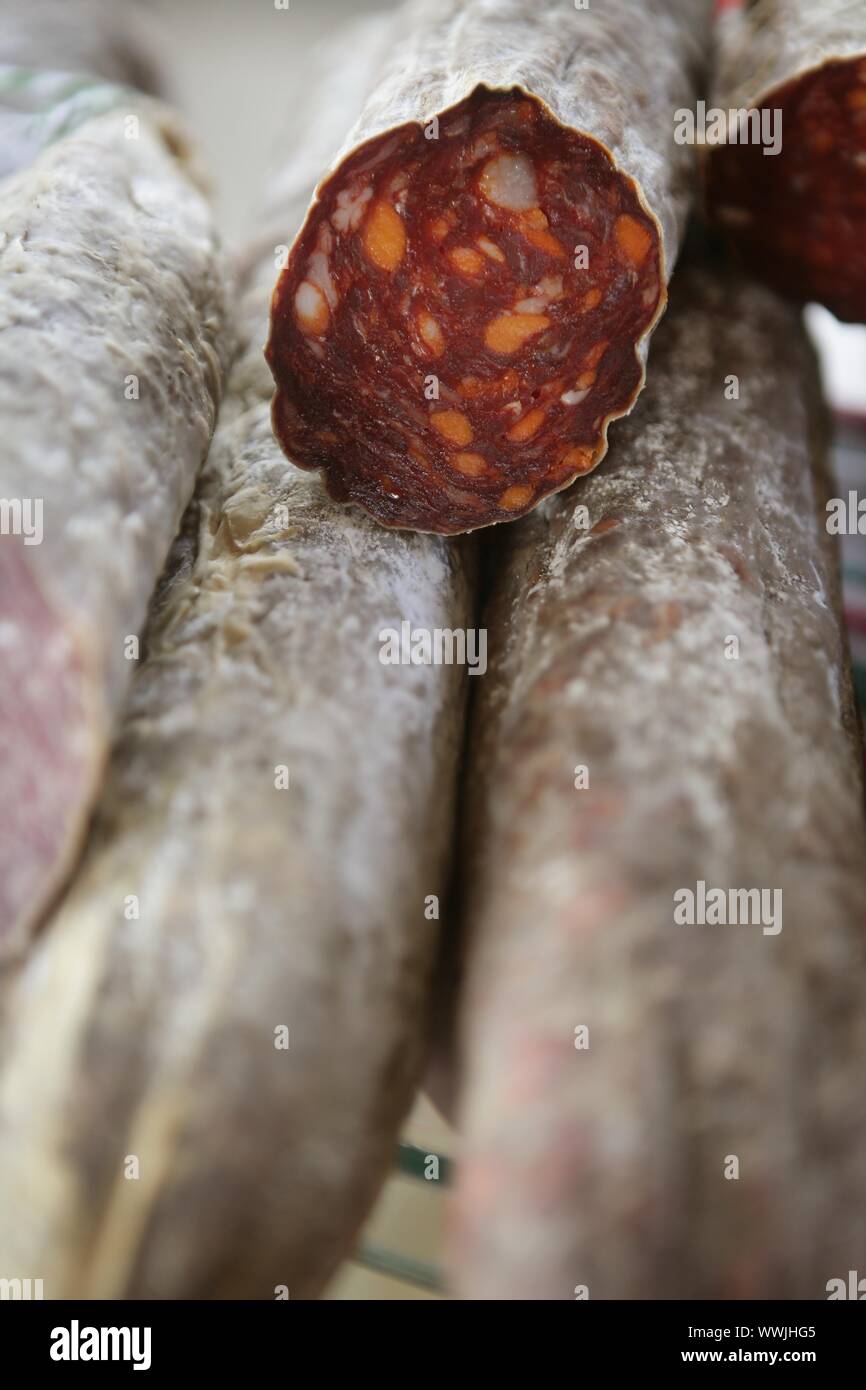 Cured red pepperoni in the mediterranean market in Spain Stock Photo
