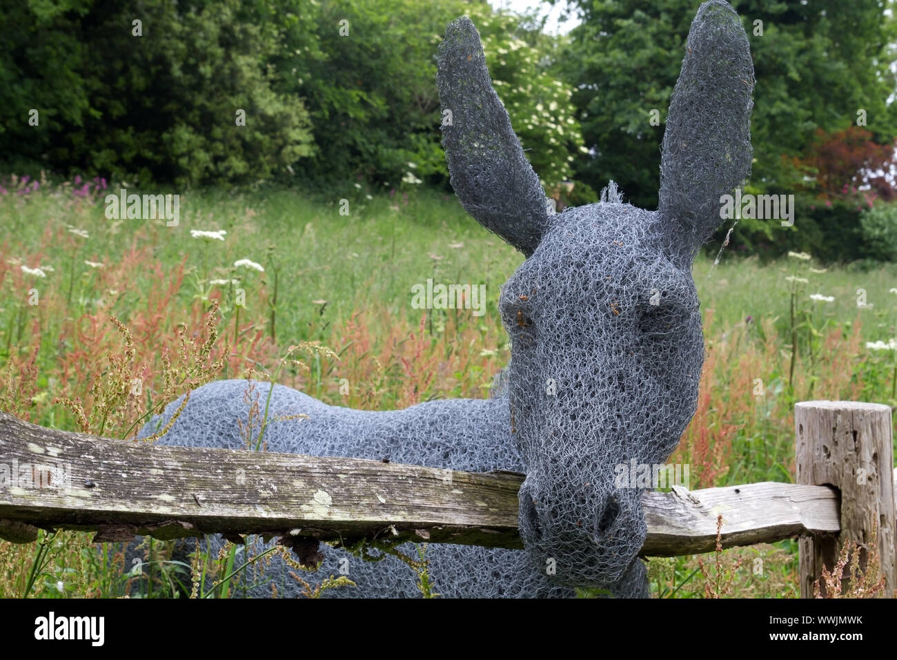 Donkey made of wire mesh in the garden Stock Photo