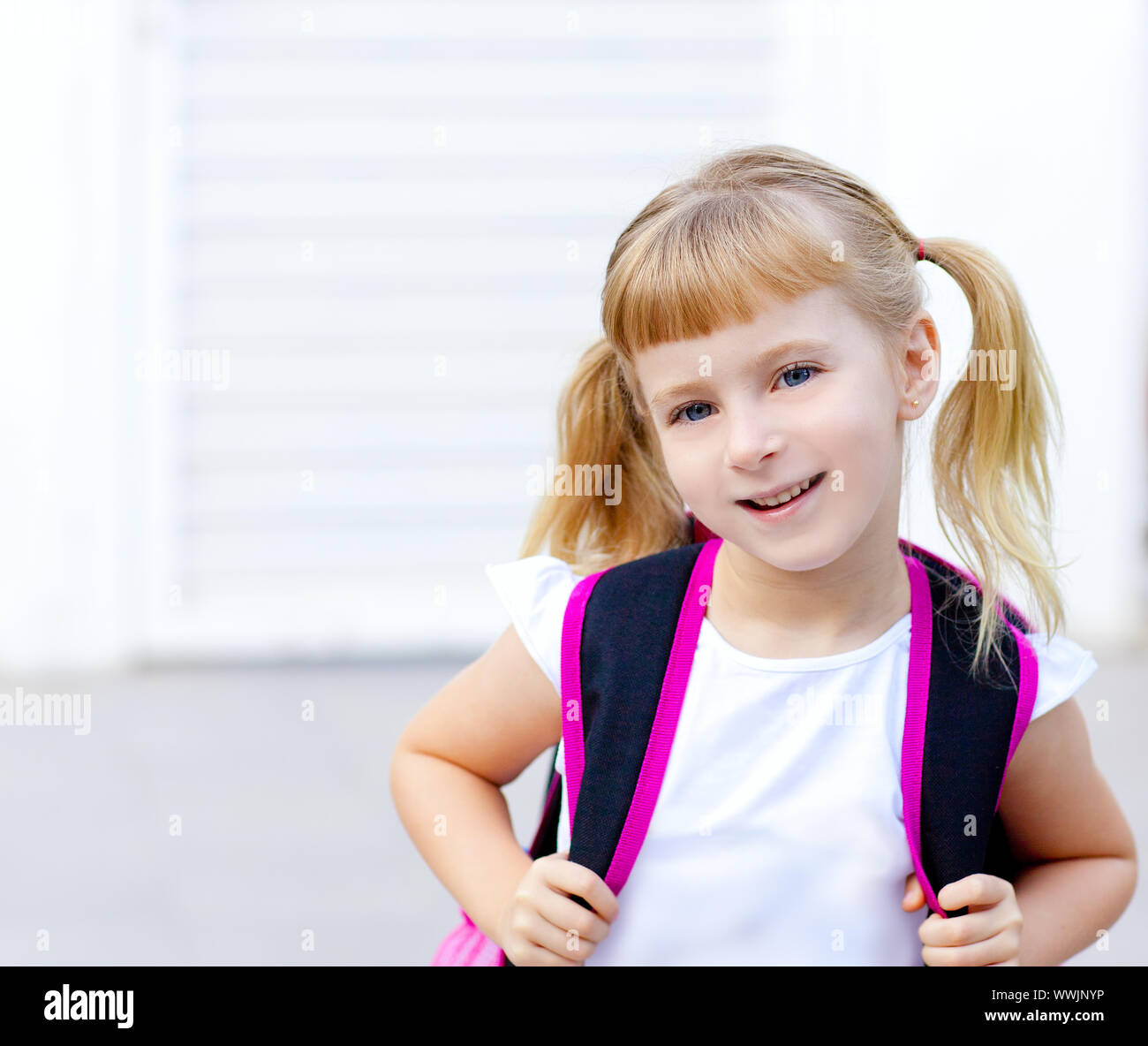 children little girl with pigtails going to school with backpack Stock ...
