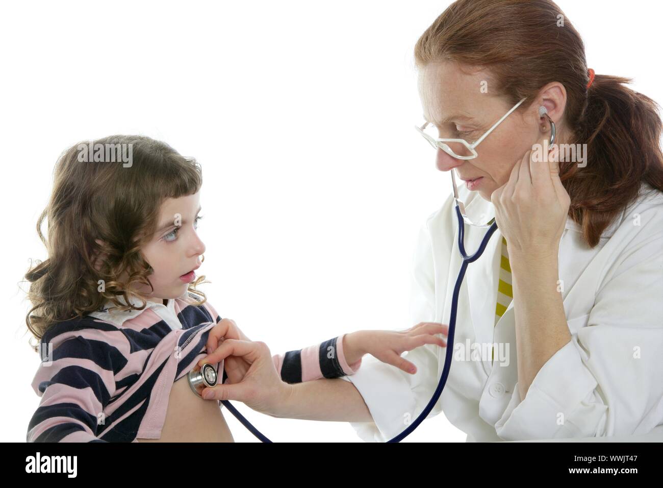 Pediatrician woman doctor stethoscope medical exam little girl Stock