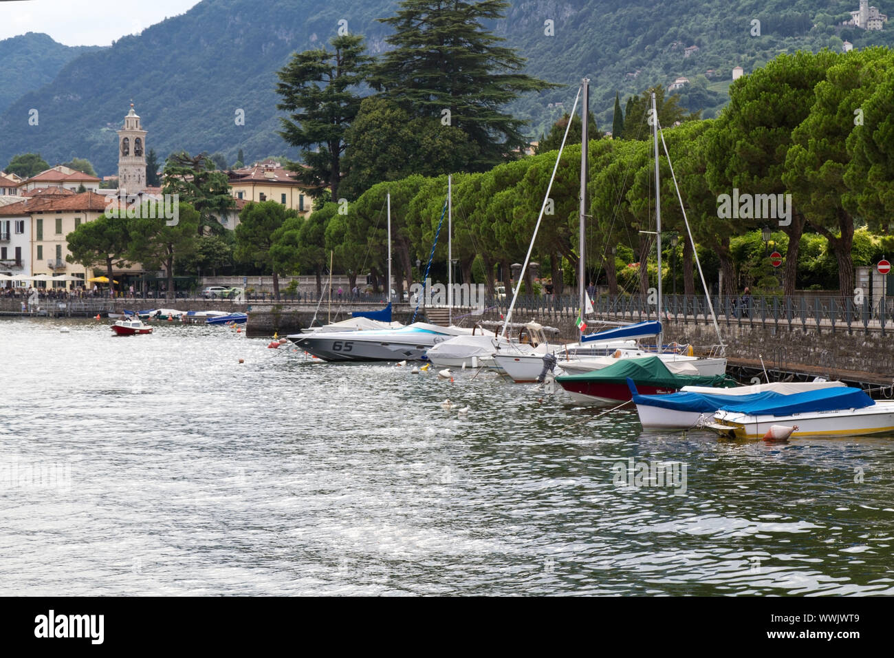 The small boat harbour of the village of Colonno on Lake Como, Italy ...