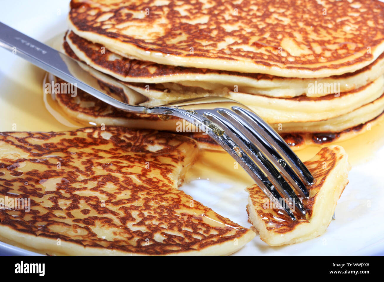 pile of american pancakes with syrup Stock Photo Alamy