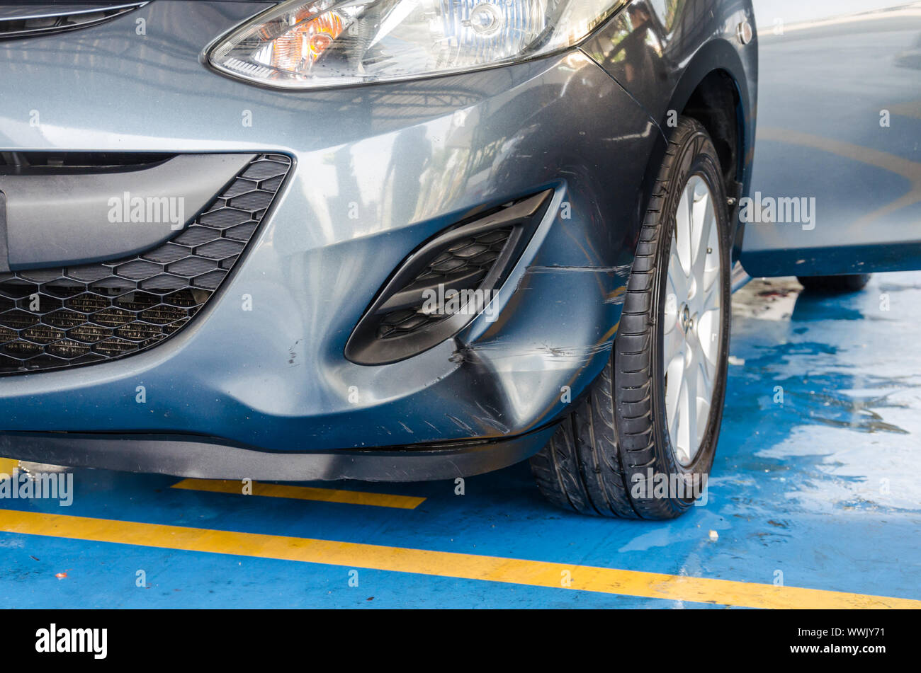 Gray car bump marks on the front bumper Stock Photo Alamy