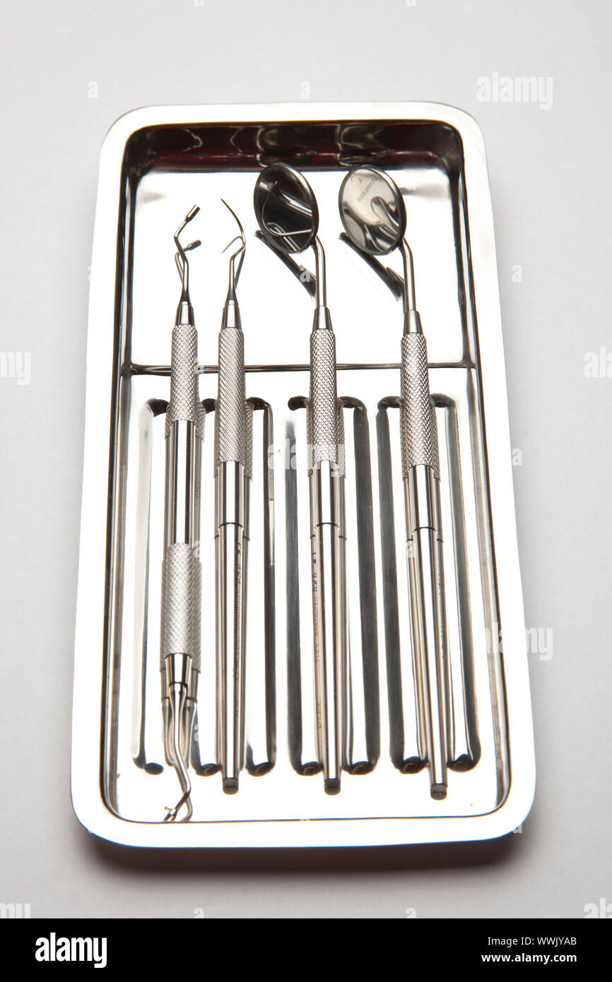 Dental Instruments - angled mirrors, plate, tools Stock Photo - Alamy