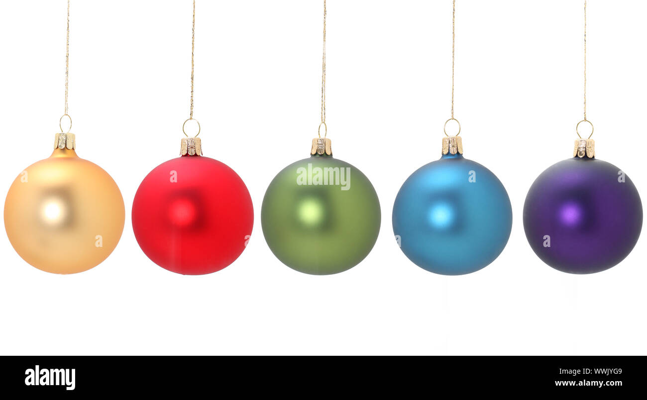 Five different colored christmas balls hanging from golden thread, Gold/Yellow, Red, green, blue, violet, shot in studio isolated on white.  Perfect f Stock Photo